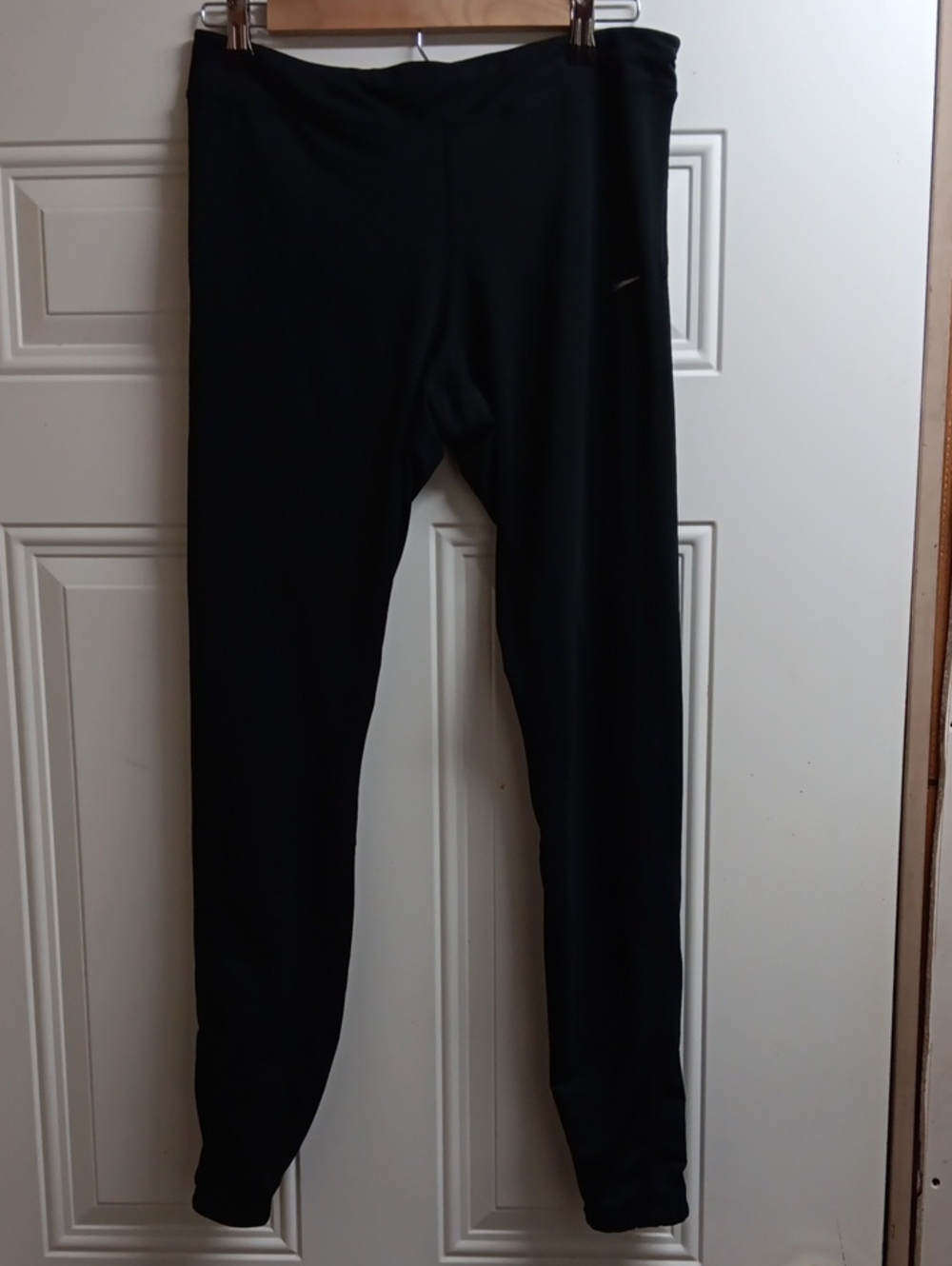 Nike Women's Black Athletic Leggings with Small Swoosh